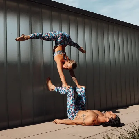 acrobuddhas Instagram post about Acro yoga photography