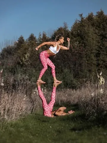 acrobuddhas Instagram post about Branded acro yoga imagery