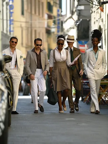 amidestevens Instagram post about Pitti Uomo group portrait