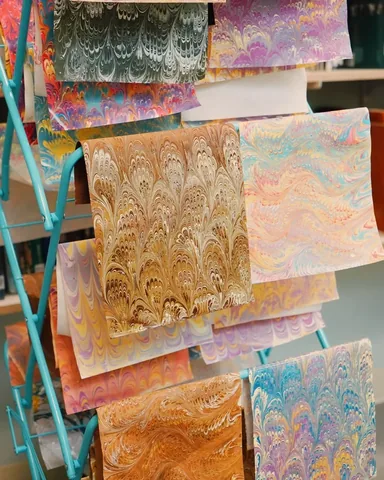 arielbissett Instagram post about Paper marbling