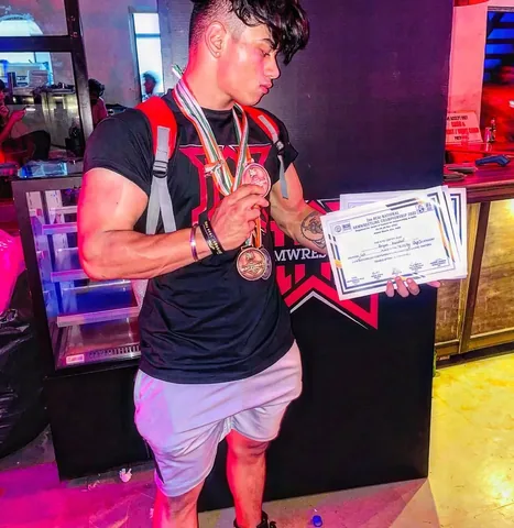 aryan.kandari.fitness Instagram post about Armwrestling achievement