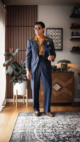 bchanism Instagram post about Navy suit styling