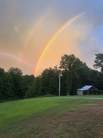 beneathmyheart Instagram post about Double rainbow