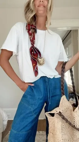 caitlynwarakomski Instagram post about Scarf styling and event promotion