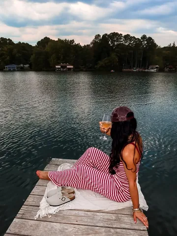 carolinecoleburn Instagram post about Lake lifestyle and fall fashion