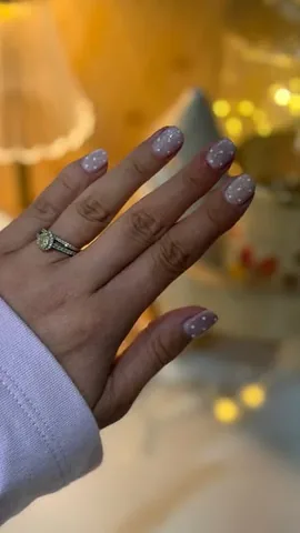 charltaylor Instagram post about Polka dot cat eye nails