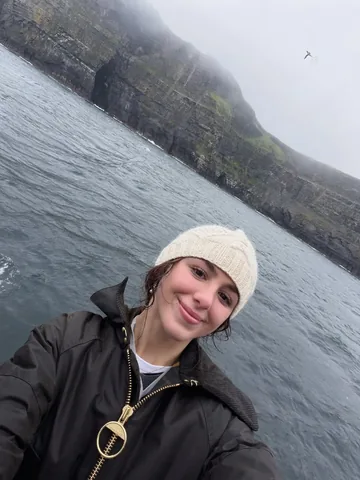 chloelukasiak Instagram post about Cliffs of Moher travel