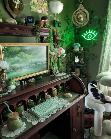 cozy.goblin.gaming Instagram post about Green gaming setup