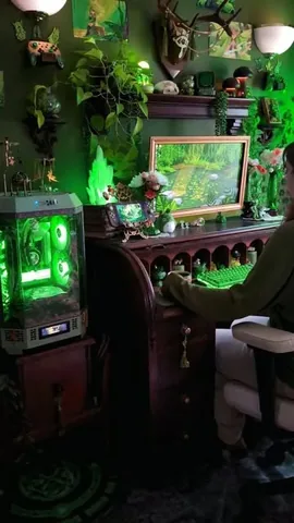 cozy.goblin.gaming Instagram post about Green gaming setup