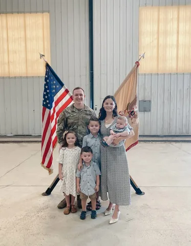 cradlecatholicmom Instagram post about Military family reunion