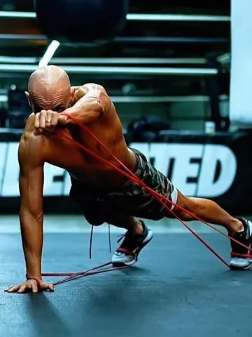 frank_medrano Instagram post about Resistance band push ups