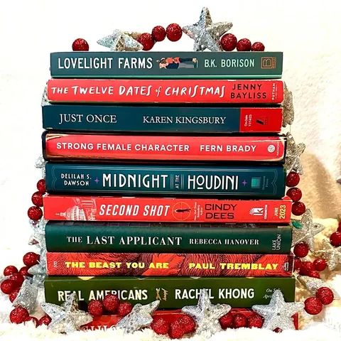 geauxgetlit Instagram post about Holiday book stack