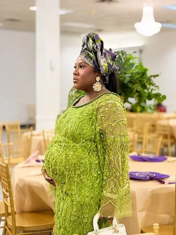 hermillennialcloset Instagram post about Pregnancy wedding guest style