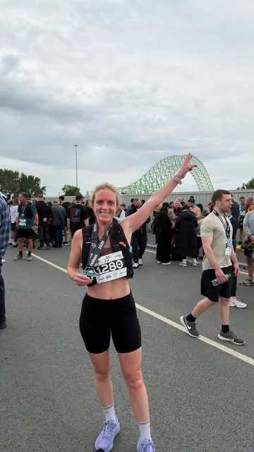 holisticnics Instagram post about Postpartum half marathon experience
