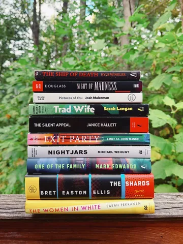 jess_reads_books Instagram post about September TBR stack