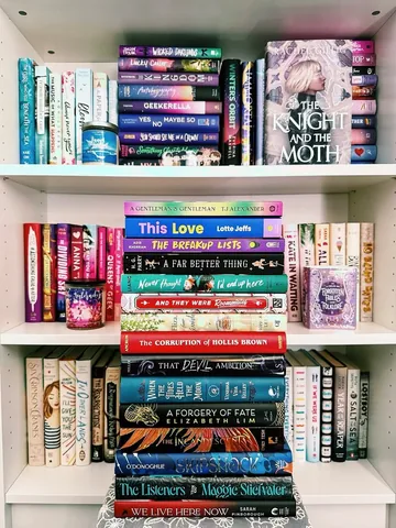 lovelybookishbelle Instagram post about June reading recap and book haul
