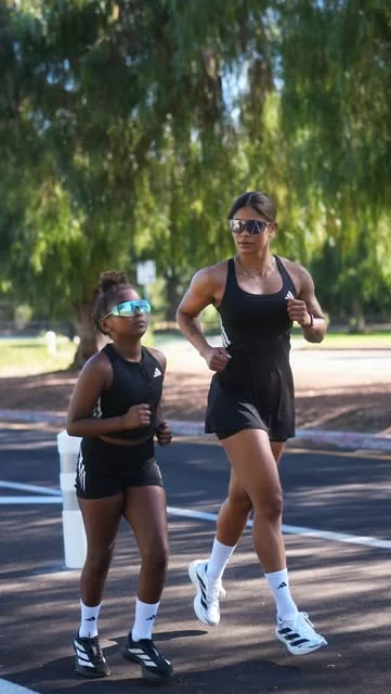 massy.arias Instagram post about Parenting through fitness