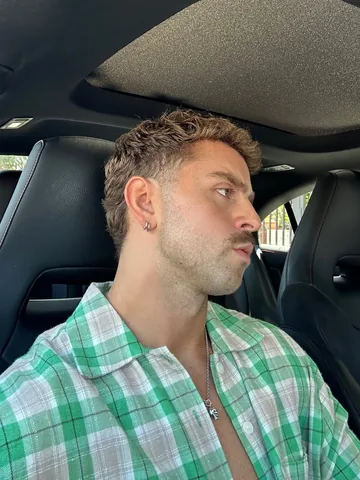 michaeldameski Instagram post about Barbering and personal style