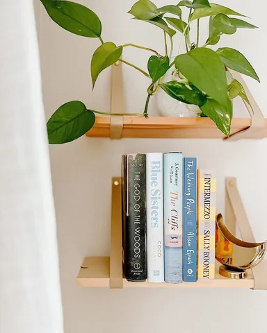 michellereadsbooks Instagram post about Vacation reading stack