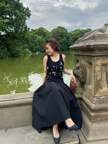 nina.new.york Instagram post about Black outfit styling