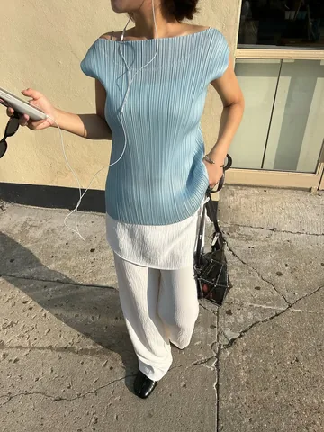 nina.new.york Instagram post about Pleated fashion