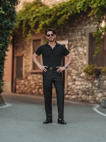 omarspaneshi Instagram post about Black on black outfit