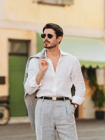 omarspaneshi Instagram post about Relaxed linen suit styling