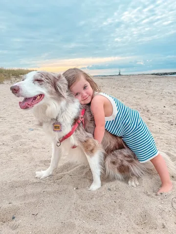 pharrellandrosie Instagram post about Dogs and child companionship