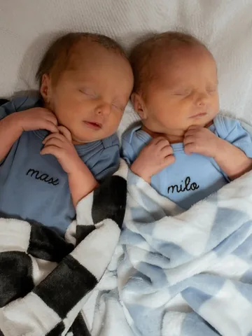 say.whatpodcast Instagram post about Twin birth announcement