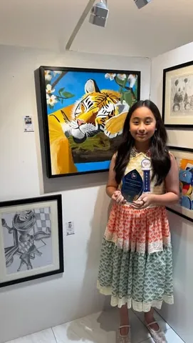 scarletsnowbelo Instagram post about Children’s art exhibition