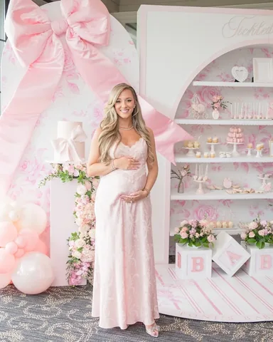 simply.toni Instagram post about Baby shower fashion