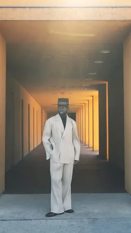 stevenonoja Instagram post about Black suit styling
