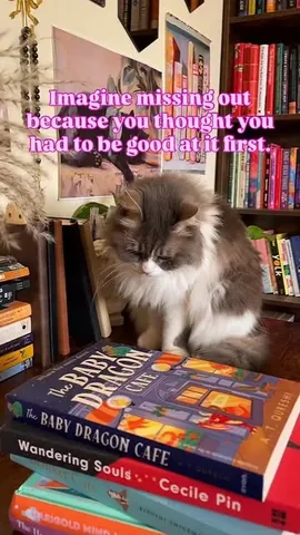 sumaiyya.books Instagram post about Cats and books