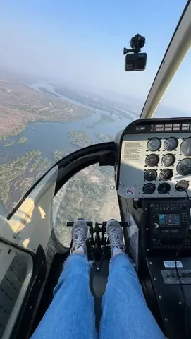 swissvoyagers Instagram post about Victoria Falls helicopter tour