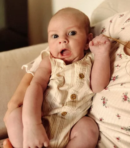 themodestmom Instagram post about Infant milestone