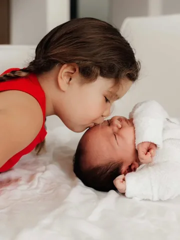 tiaclair1 Instagram post about Birth and family