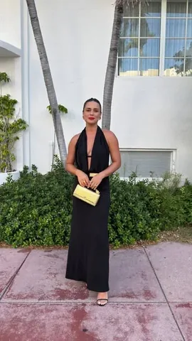 uptownwithellybrown Instagram post about Miami travel and outfit