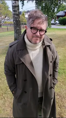 welldresseddad Instagram post about Trench coat styling
