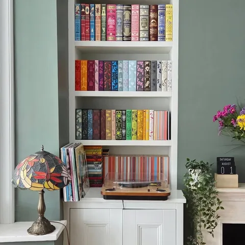 whatsallyreadnext Instagram post about Book collection and new home